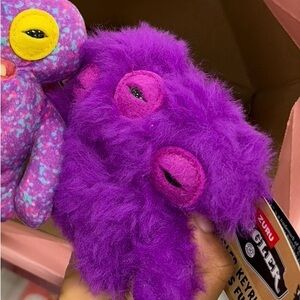 Zuru Fuzzy Purple Keychain Plush
Bundle for Carla